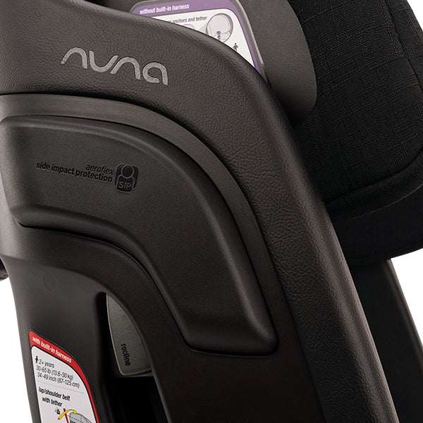 Nuna LUMN Harness Booster Car Seat in Caviar Detailed Image of Side Impact Protection and Nuna Logo