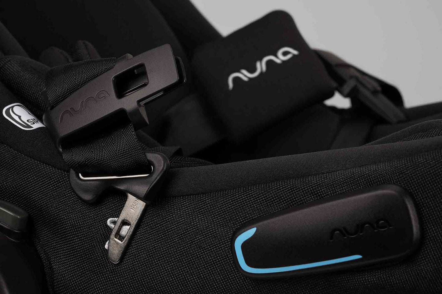 Nuna Pipa Aire RX Infant Car Seat magnetic buckle holders