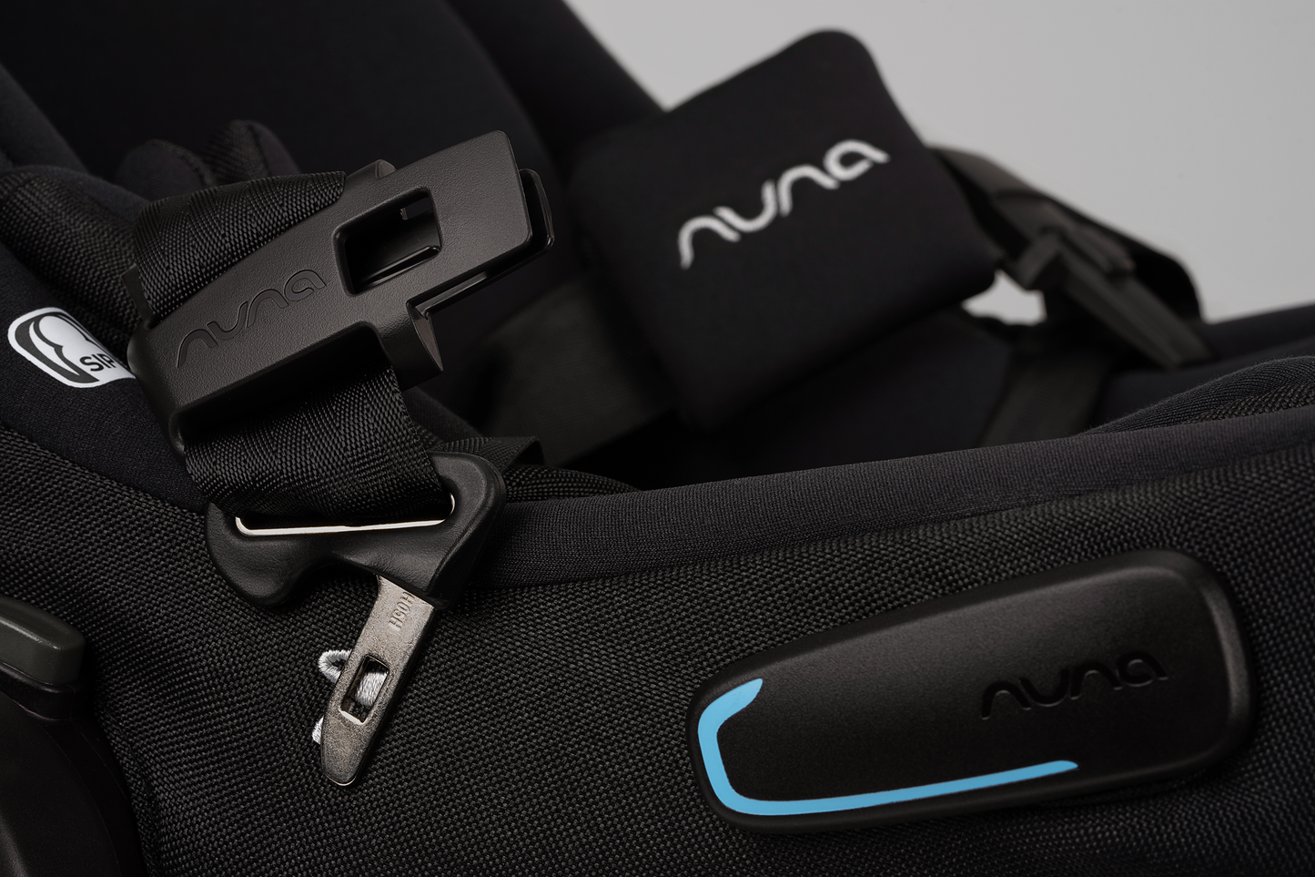 Nuna Pipa Aire RX Infant Car Seat magnetic buckle holders