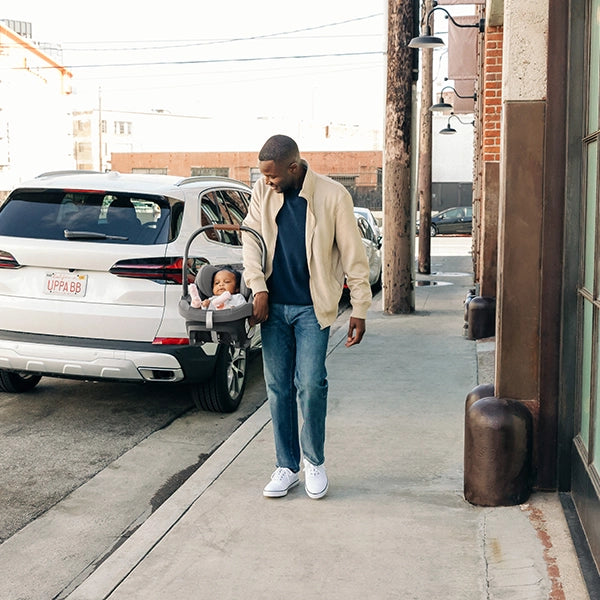 UPPAbaby Aria in Greyson with Dad Carrying with Ergonomic Carry Handle