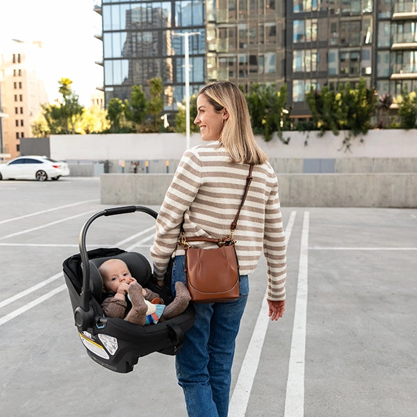 UPPAbaby Aria in Jake with Mom Carrying Baby Ergonomically Lifestyle