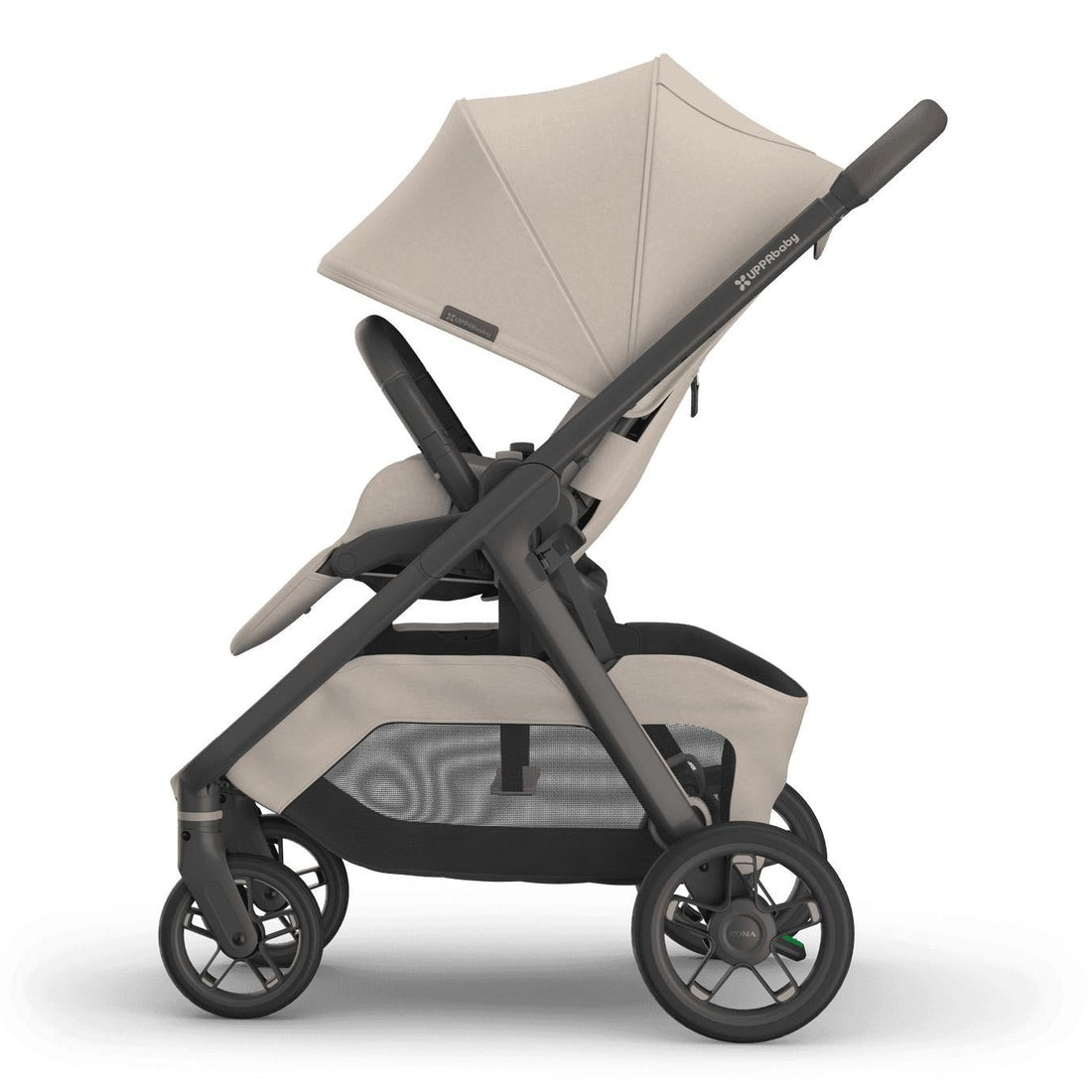 
Side profile of a beige baby stroller with an extended sun canopy and grey frame, isolated on a white background.