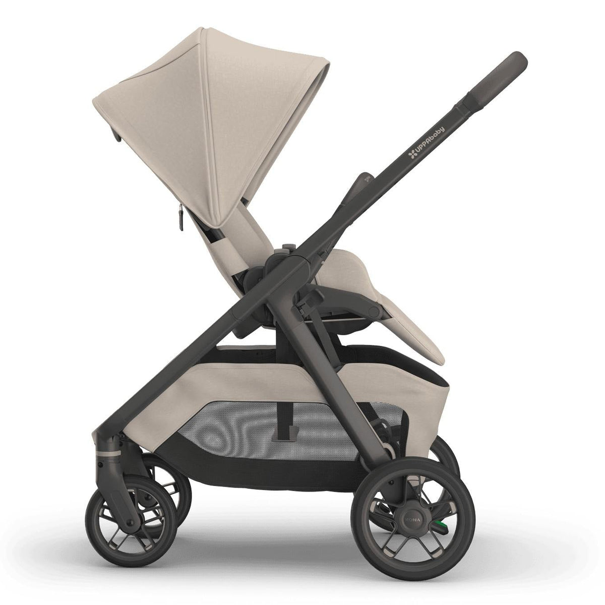 
Side profile of a beige parent-facing baby stroller with a grey frame and sun canopy, isolated on a white background.