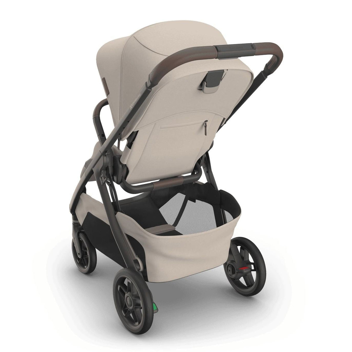 
Three-quarter rear view of a beige baby stroller with a grey frame, canopy, and storage basket, isolated on a white background.