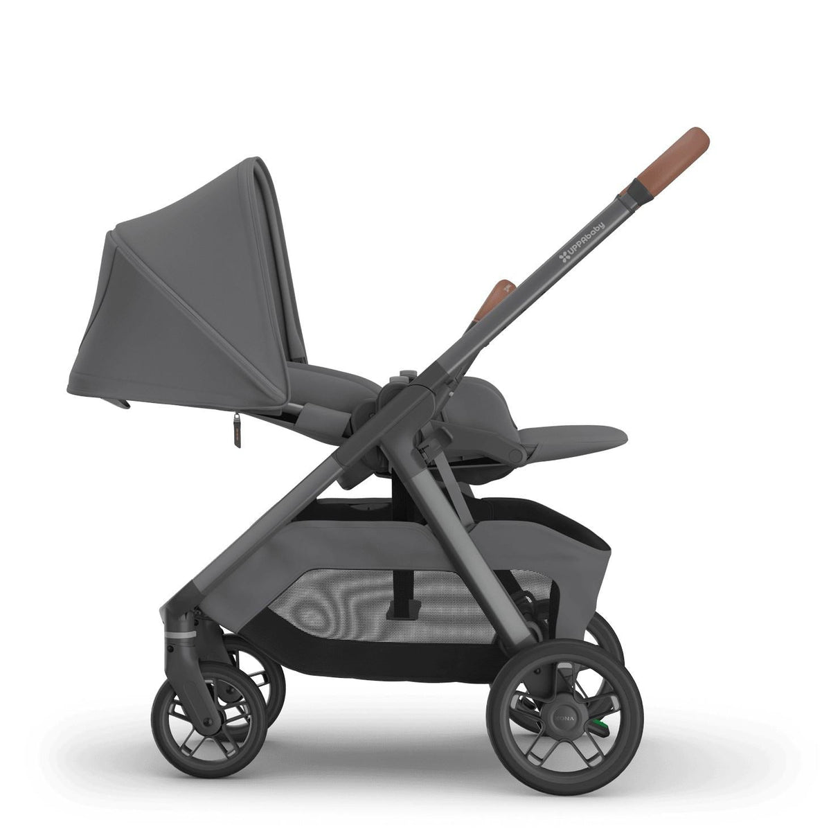 
Side profile of a reclined grey parent-facing baby stroller with brown leather handle grips, isolated on a white background.