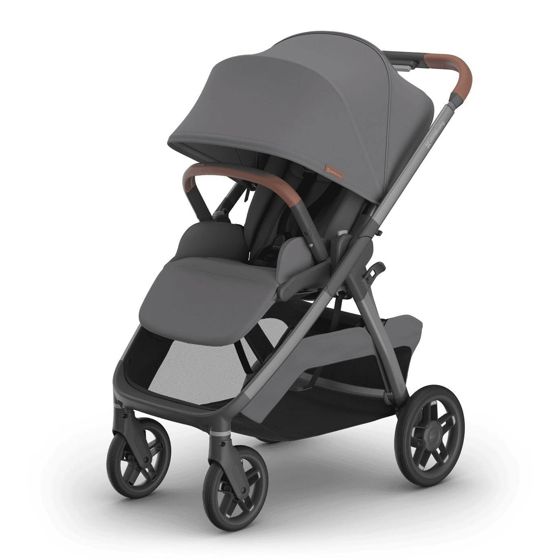 
Three-quarter front view of a grey forward-facing baby stroller with brown leather handle grips and a storage basket, isolated on a white background.
