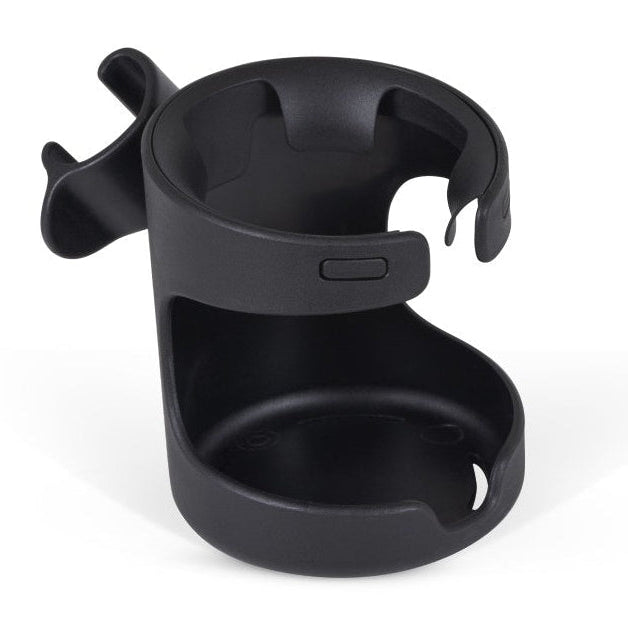 
Close-up view of a black plastic cup holder attached to a stroller frame.