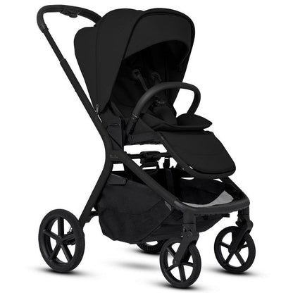 An all-black modern stroller shown fully open from a three-quarters perspective.