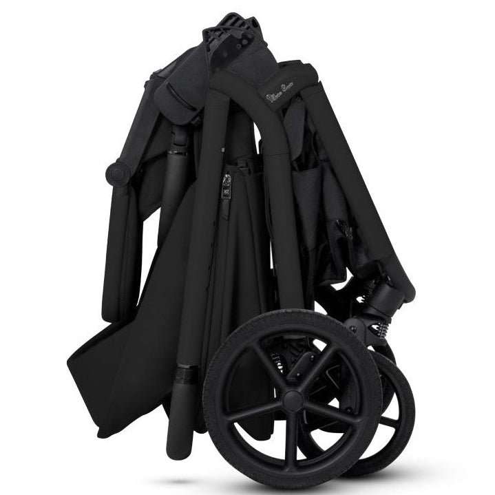 Side profile of an all-black stroller frame shown compactly folded.