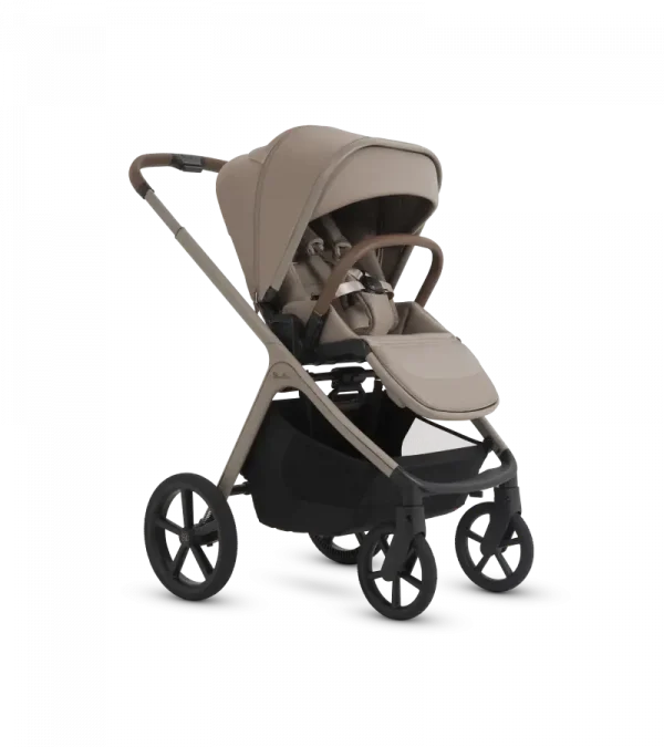 A modern stroller in a taupe-beige fabric with a black frame and wheels, shown from a three-quarters angle on a white background.