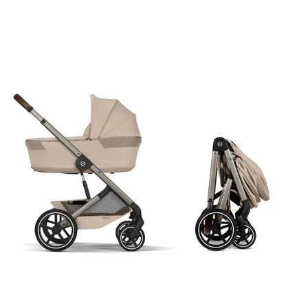 Cybex Balios Fold Cot on Balios S Lux Stroller featuring the bassinet carry cot folding on the stroller