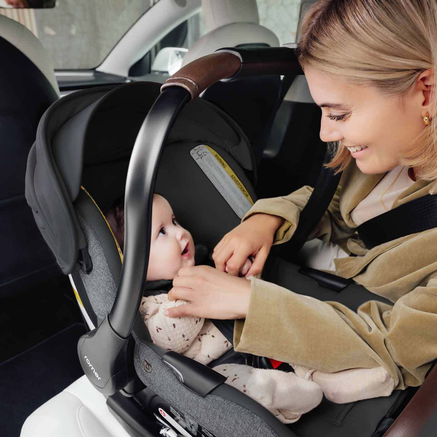 Romer Juni Infant Car Seat with Versa Base, SecureLoc Technology, Luxury Cover - Peppercorn