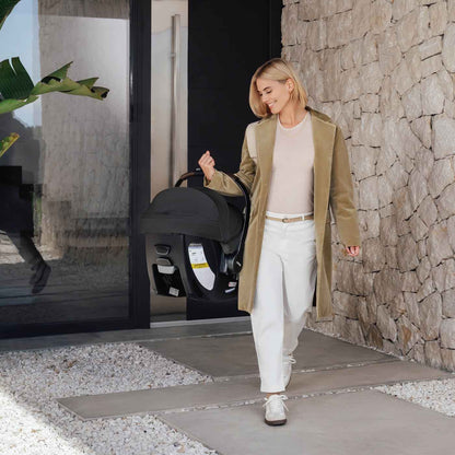 Romer Juni Infant Car Seat with Versa Base, SecureLoc Technology, Luxury Cover - Peppercorn