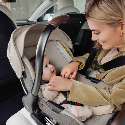 Romer Juni Infant Car Seat with Versa Base, SecureLoc Technology, Luxury Cover - Truffle