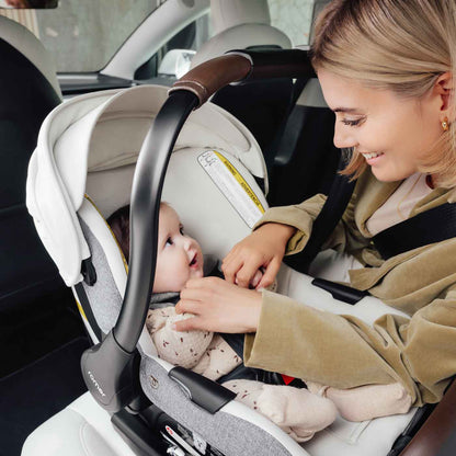 Romer Juni Infant Car Seat with Versa Base, SecureLoc Technology, Luxury Cover - Pearl