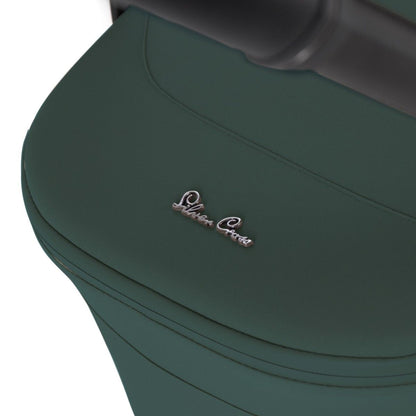 A close-up view of a metallic script emblem on an olive green stroller fabric cover.