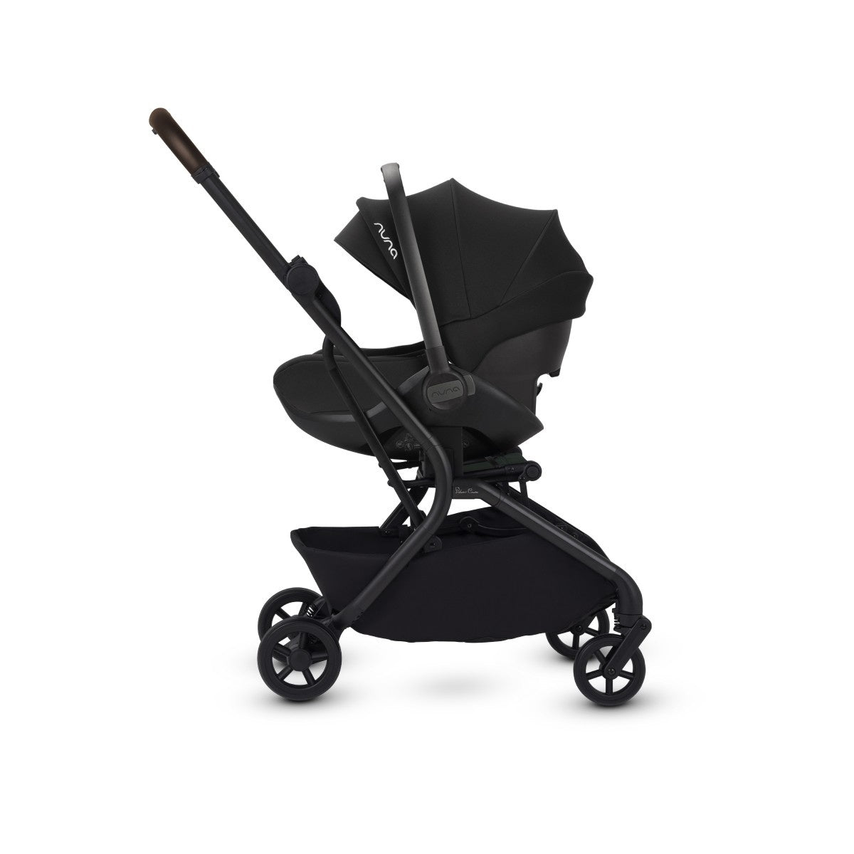 Side profile of a black travel stroller frame holding an attached black infant car seat.