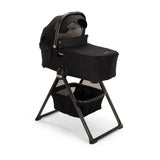 Nuna Demi Series Bassinet on Stand Product Hero Image in Chocolate Caviar