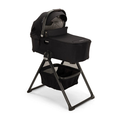 Nuna Demi Series Bassinet on Stand Product Hero Image in Chocolate Caviar