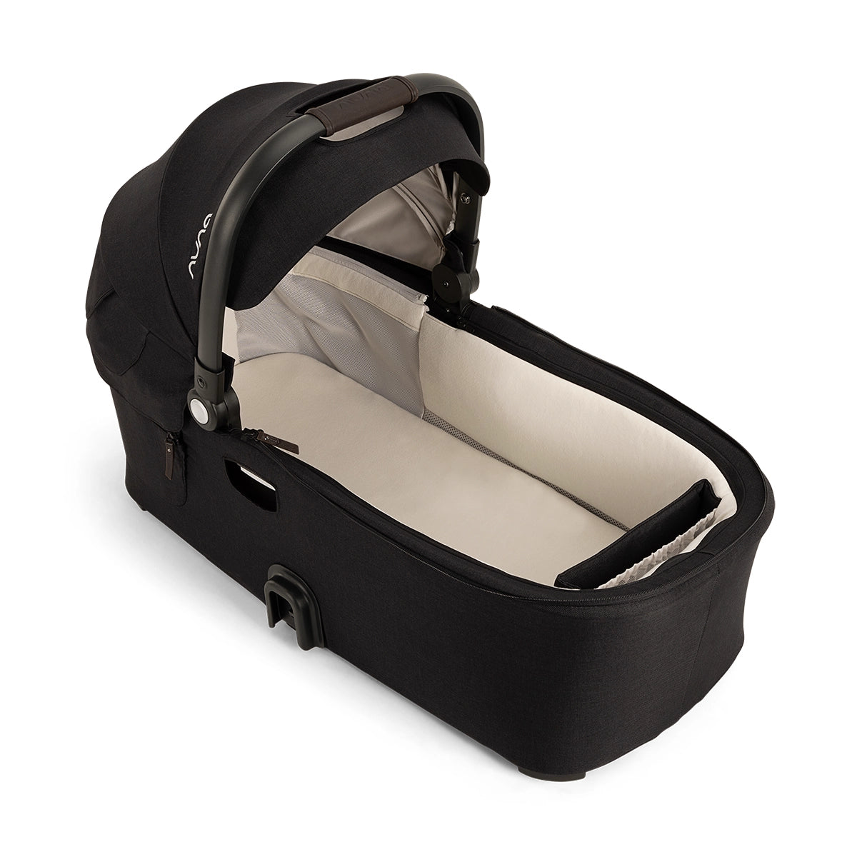 Demi Series Bassinet in refreshed caviar overhead photo showing interior mattress and sheet