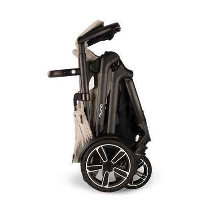 
Folded stroller with 'Nuna' branding on a white background