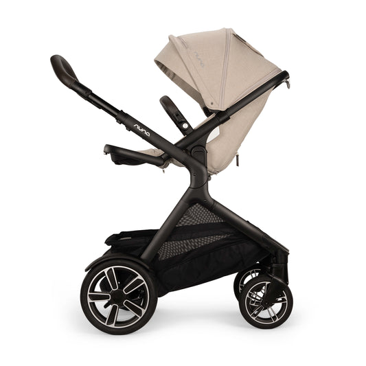 [Biscotti/Biscotti] A stroller with a black frame and a beige canopy, shown from a side profile on a white background.