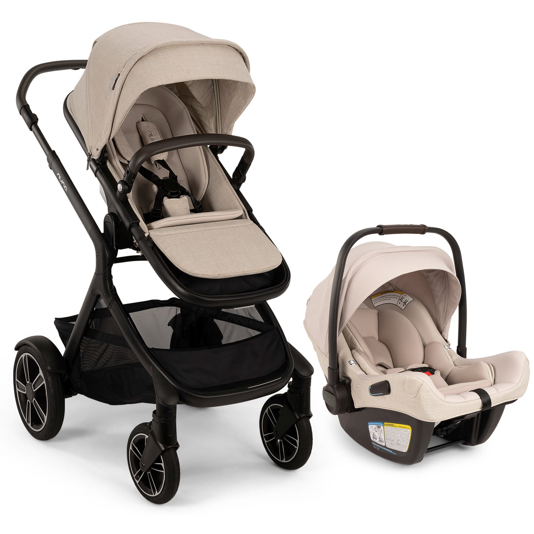 
A baby stroller and matching infant car seat in a coordinated light beige and black colorway, shown on a clean white studio background.
