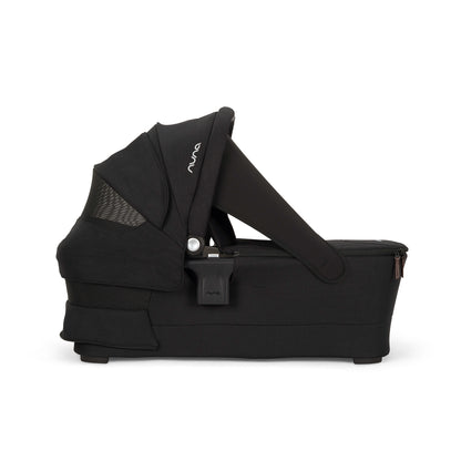 
TRIV & SWIV series bassinet shown without the stand with Iconic Sky drape for extra privacy shown