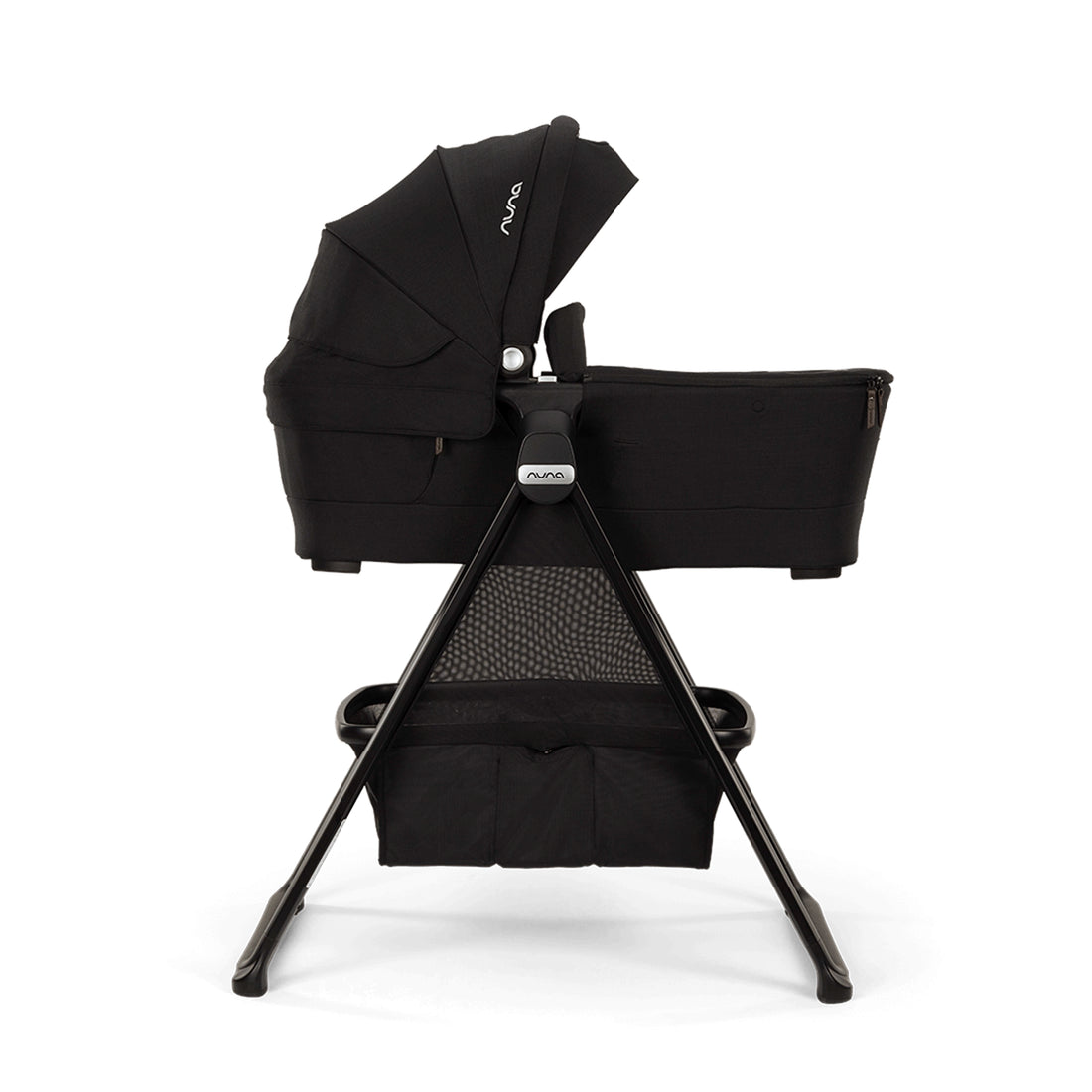 
Nuna Swiv & Triv series bassinet shown on stand that's stuiable for overnight sleep profile view of product image