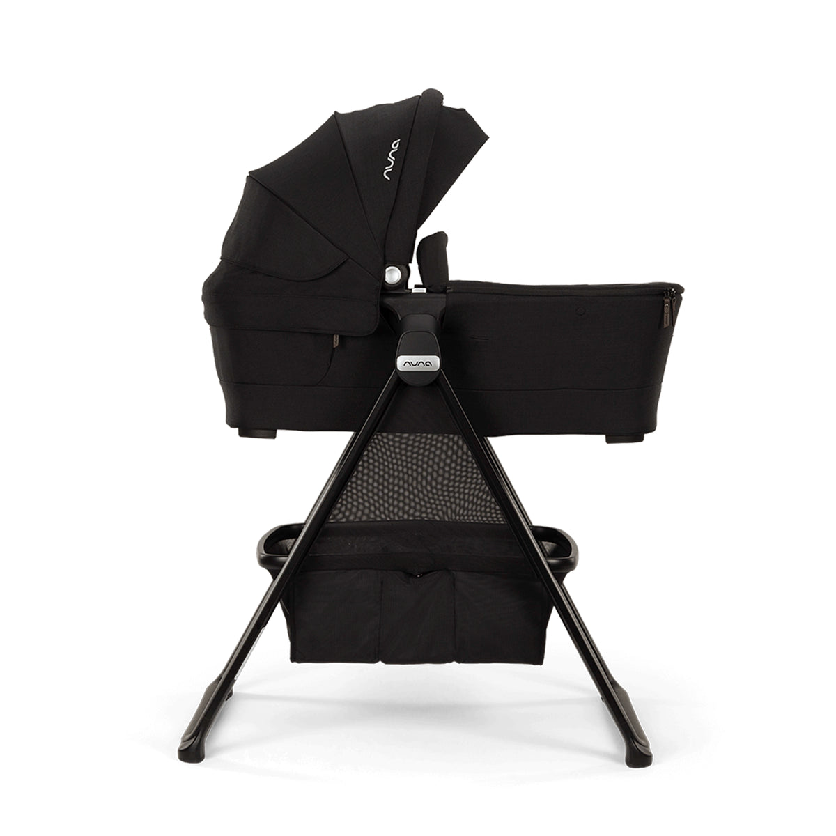 
Nuna Swiv & Triv series bassinet shown on stand that's stuiable for overnight sleep profile view of product image