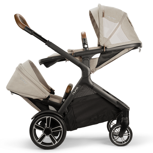 The stroller for three New Nuna DEMI Grow Double Stroller + Rider board 