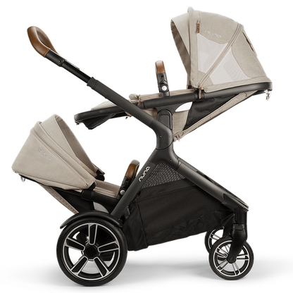 The stroller for three New Nuna DEMI Grow Double Stroller + Rider board 
