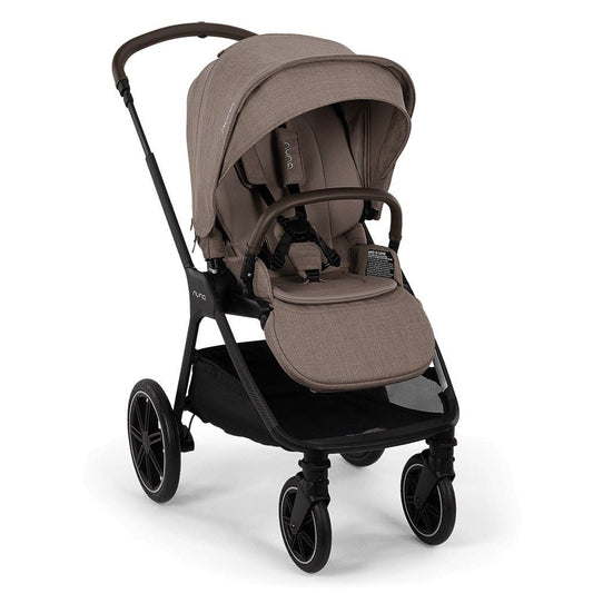 A modern stroller in a taupe-beige fabric with a black frame, shown from a three-quarter angle against a solid black background.