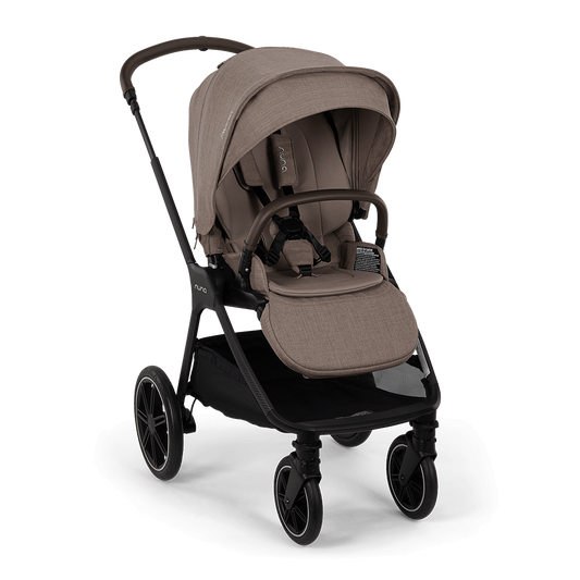 A modern stroller in a taupe-beige fabric with a black frame, shown from a three-quarter angle against a solid black background.
