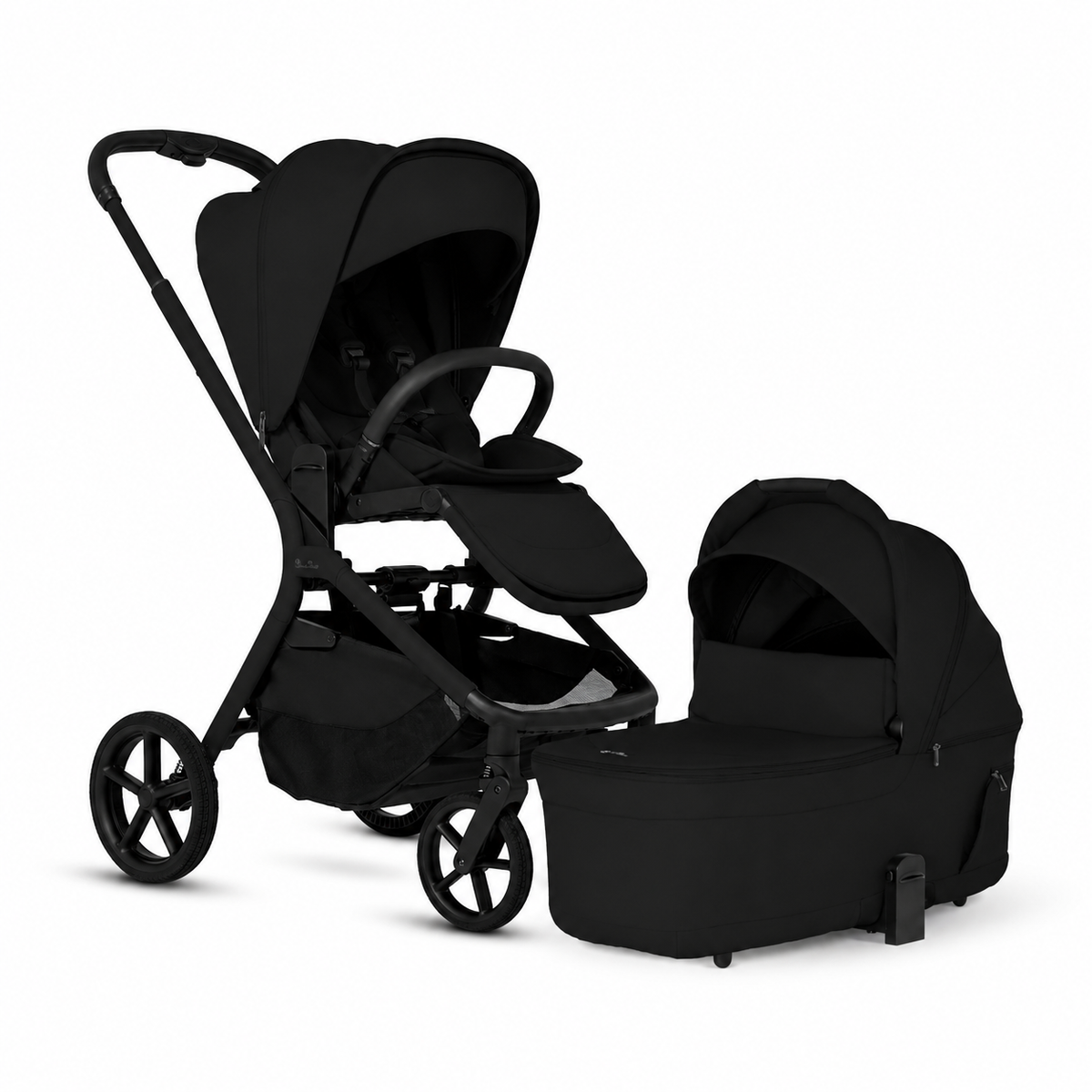 A black stroller and bassinet travel system shown on a clean white background. The stroller has a large canopy, footmuff, and four wheels, and is positioned next to a matching bassinet with a hood.