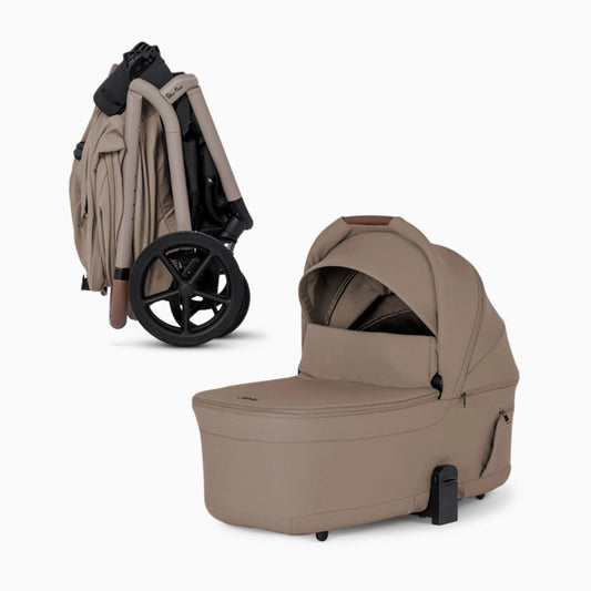 Silver Cross Breez Bassinet product image in Champagne and folded on stroller to easily store in small sapces