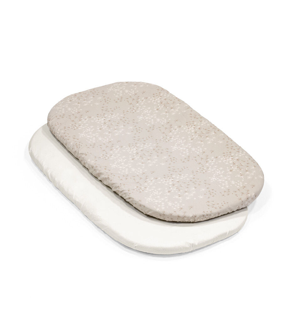 Snoozi comfortable baby bassinet and mattress made by stokke 