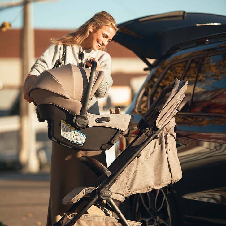 car seat and stroller for girl Nuna TRVL Lx + PIPA Aire Travel System