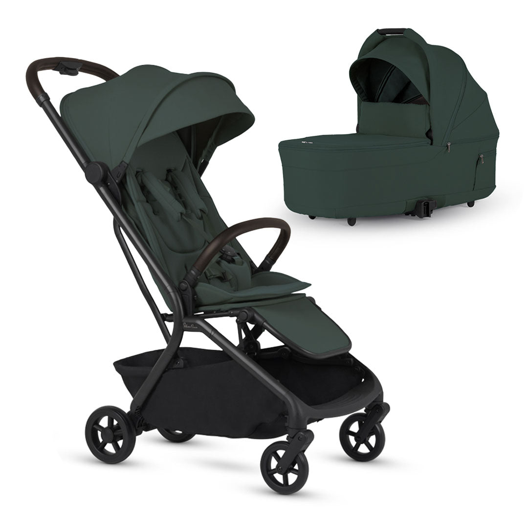 A dark green baby stroller with a black frame alongside a matching dark green detachable bassinet, both set against a white background.
