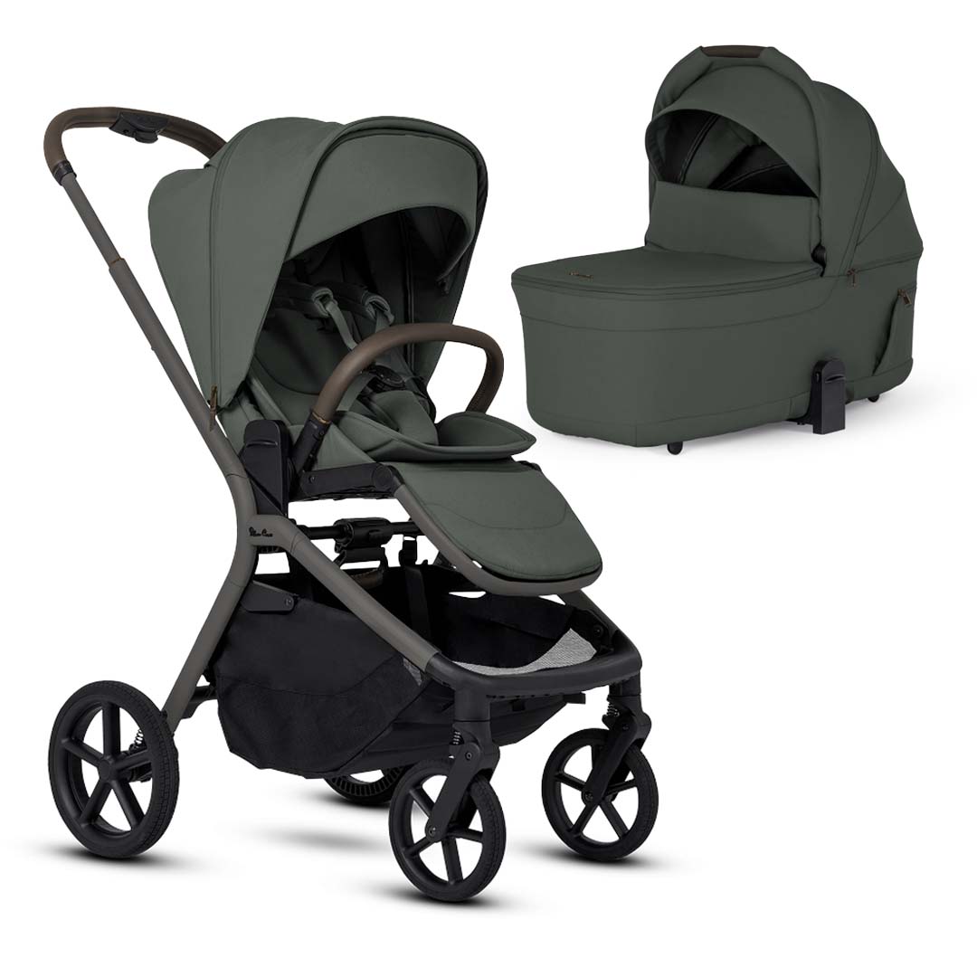 A pewter grey baby stroller with a grey and black frame alongside a matching pewter grey detachable bassinet, both set against a white background.