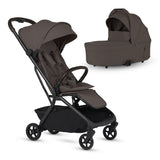 A chocolate brown baby stroller with a black frame alongside a matching chocolate brown detachable bassinet, both set against a white background.