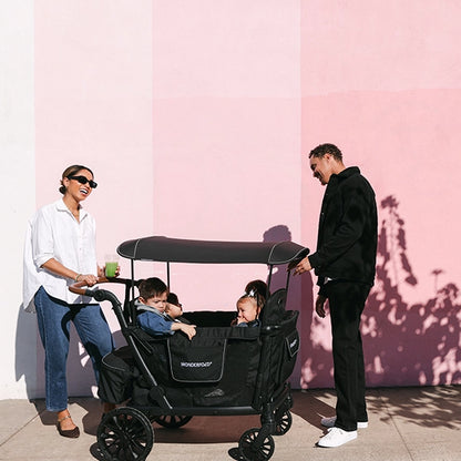 Wonderfold L4 Quad Stroller Wagon in Black Lifestyle View