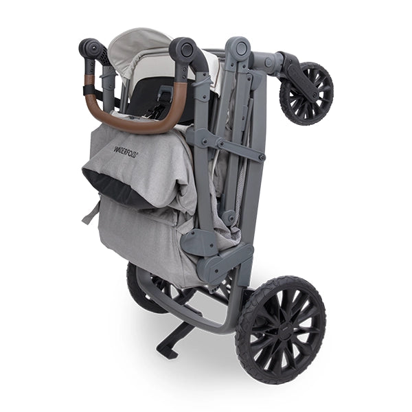 Wonderfold L4 Quad Stroller Wagon in Gray Folded Standing on Wheels