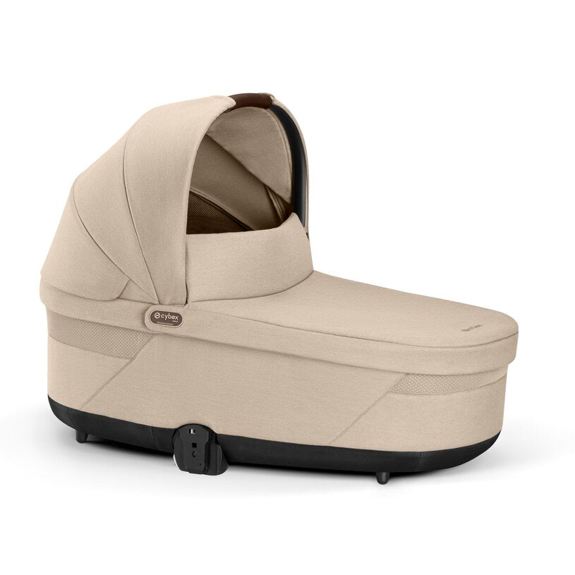 
Beige baby carrier with black accents on a white background