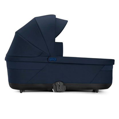 
Navy blue baby carrier with a visible brand logo on a white background