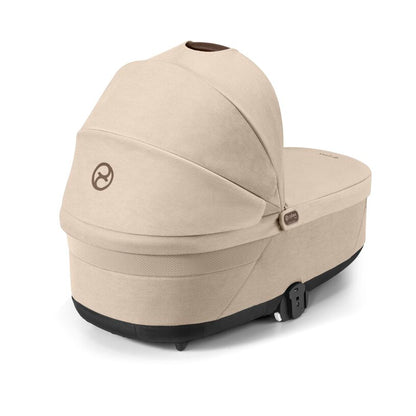 
Beige baby stroller carrier on a white background
