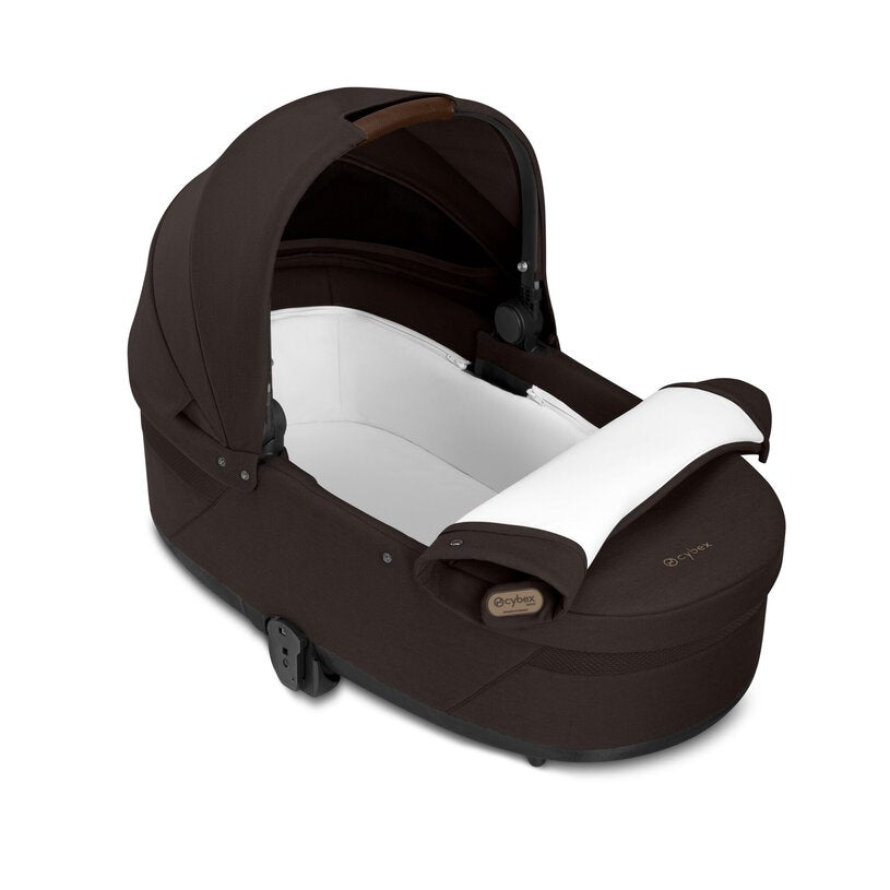 
Brown baby car seat with white interior on a white background