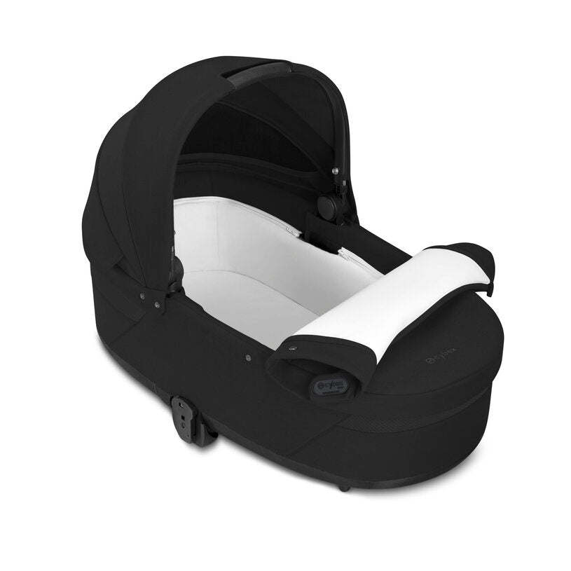 
Black baby car seat with white interior on a white background