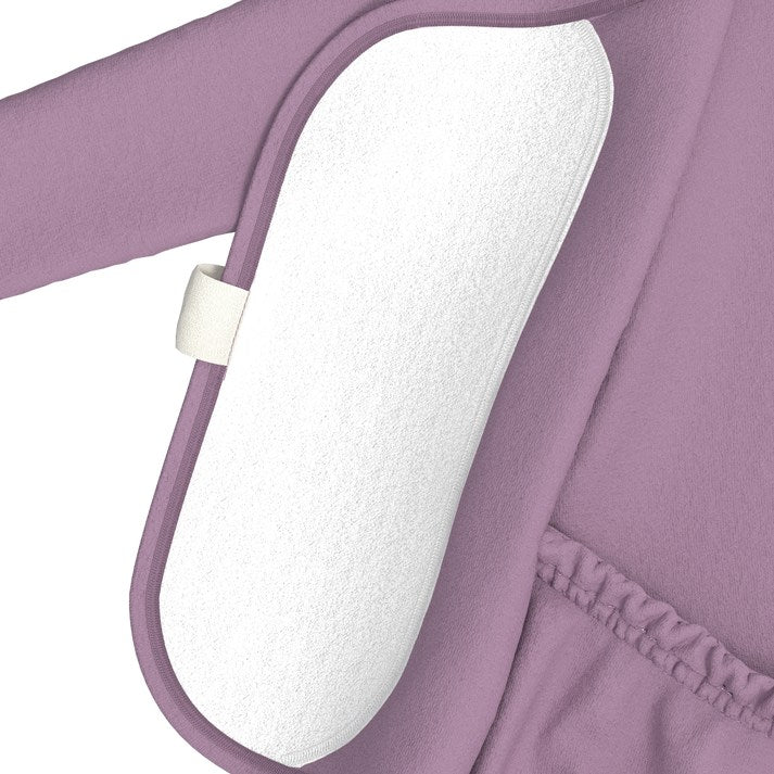 Close-up of a purple garment with a white cushioned strap on a white background
