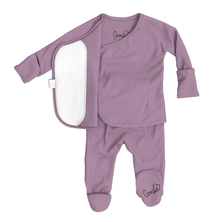 Purple baby outfit with a jacket and pants on a white background